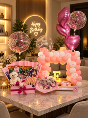 Birthday Dreamscape with pink balloon arch, flowers and gift hamper