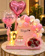 Load image into Gallery viewer, Butterfly Reverie birthday setup with pink balloons, butterfly decorations, cake and red rose bouquet