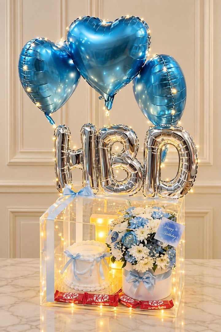 Blue Radiance birthday setup with blue heart balloons and flowers
