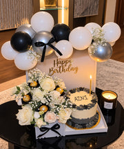  Black, white and silver birthday set with cream roses, custom name cake, Ferrero Rocher and balloon garland