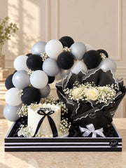 White Rose Affair luxury gift box with white roses, cake, baby’s breath flowers and black white balloon decoration