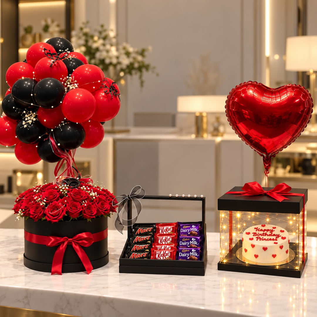 Scarlet Noir Signature luxury birthday gift set with red roses, black balloons, chocolates and illuminated cake box