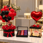 Scarlet Noir Signature luxury birthday gift set with red roses, black balloons, chocolates and illuminated cake box