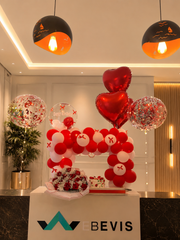 Red Velvet Arch with red and white balloons, heart-shaped balloons and confetti-filled balloons
