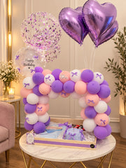Lavender birthday surprise with balloons and curated gift box