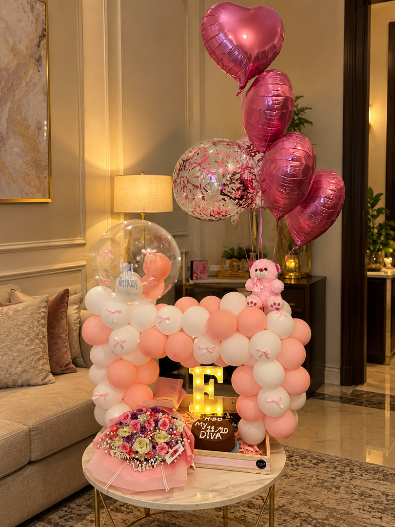 Pink and white birthday arrangement with heart balloons, floral bouquet and personalized birthday cake