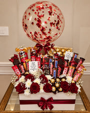 Gift box of red roses, Ferrero Rocher, Snickers, KitKat and Pringles topped with a red confetti balloon
