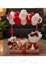 Load image into Gallery viewer, Cupid's Canopy romantic gift arrangement with red rose bouquet, LOVE cake, teddy bear, and red and white balloon canopy