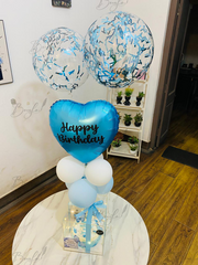 Celestial Birthday Surprise balloon gift with blue heart balloon, confetti balloons, and illuminated cake box