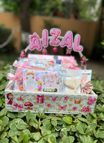 Load image into Gallery viewer, Tiny Blossom Hamper - personalized baby girl gift basket with name topper and pink accessories