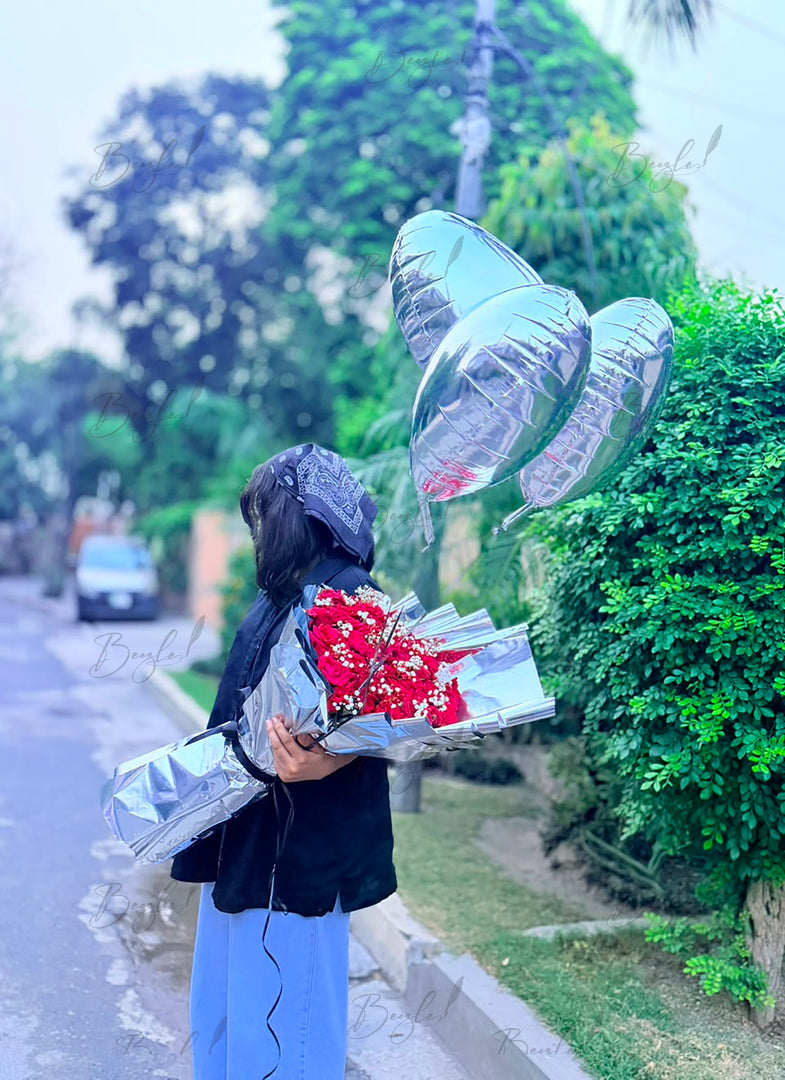 Flora Velvet premium red rose bouquet with silver wrapping and metallic balloons