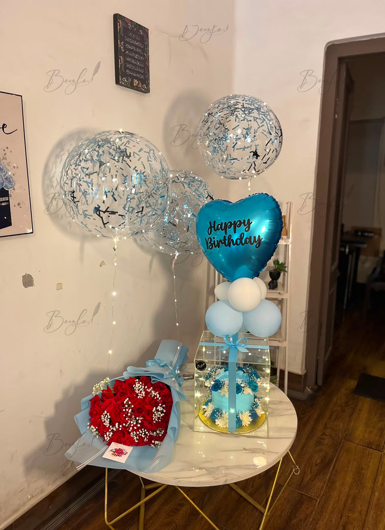 Premium Celestial Bloom gift box featuring fresh flowers, birthday cake, transparent display box, and balloons