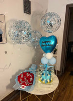 Load image into Gallery viewer, Celestial Bloom birthday gift with blue floral cake, red rose bouquet, confetti balloon, and heart birthday balloon