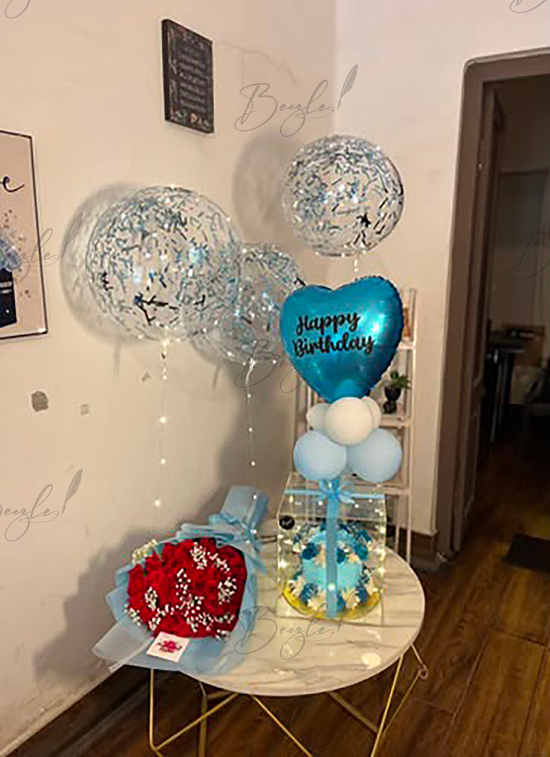 Celestial Bloom customized birthday gift with blue cake, rose bouquet, decorative balloons, and elegant gift arrangement