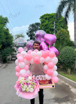 Load image into Gallery viewer, Close-up of Petaline Haven with customized bubble balloon, fresh mixed flowers, heart balloons, and elegant wooden presentation tray.