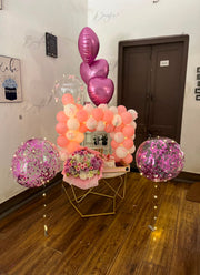 Pink Luxe Ensemble with cake, flower bouquet, chocolates and balloons