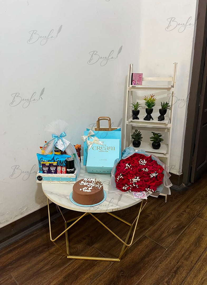 Premium birthday gift bundle with cake chocolates and rose bouquet