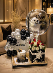 Birthday cake with red roses, personalized balloon and black white balloon arrangement