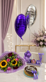 Load image into Gallery viewer, Velvet Violet luxury birthday arrangement with purple balloons, flower bouquet, cake, and chocolate hamper.
