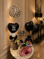 Load image into Gallery viewer, Premium black-themed birthday gift arrangement featuring heart balloon, confetti balloons, and elegant decorations.