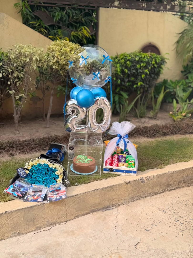Cobalt Birthday Milestone with blue rose bouquet, cake, snack basket and silver 20 balloons