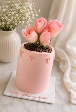 Load image into Gallery viewer, Rose Petal Cake with blush pink buttercream, fresh pink roses, bow details, and personalized birthday message on a white cake board