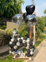 Load image into Gallery viewer, Noir Birthday Charm with black and silver balloon arch and gift box
