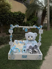 Tiny Prince Basket with teddy bear and blue baby essentials