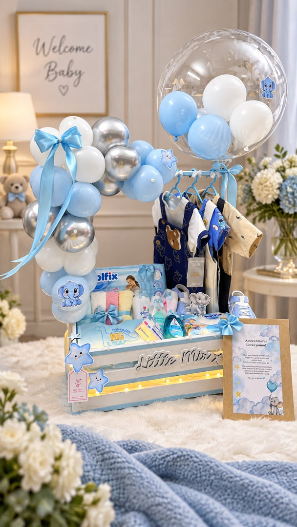 Little Bluebell newborn baby gift hamper with blue balloons, baby clothes and teddy bear