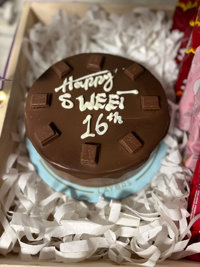 Chocolate birthday cake with chocolate icing and personalized birthday message