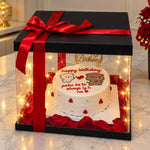 Load image into Gallery viewer, Crimson Delight luxury cake gift box with red ribbon, fairy lights and elegant birthday decoration
