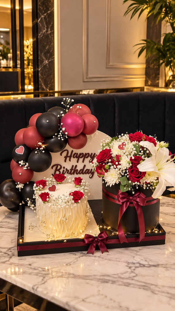 Crimson Whisper luxury gift arrangement with red roses, birthday cake, balloons and elegant decoration