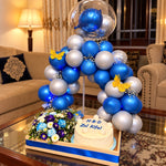 Load image into Gallery viewer, Sapphire Butterfly luxury birthday gift with blue balloon arch, flowers, butterfly decorations and custom cake