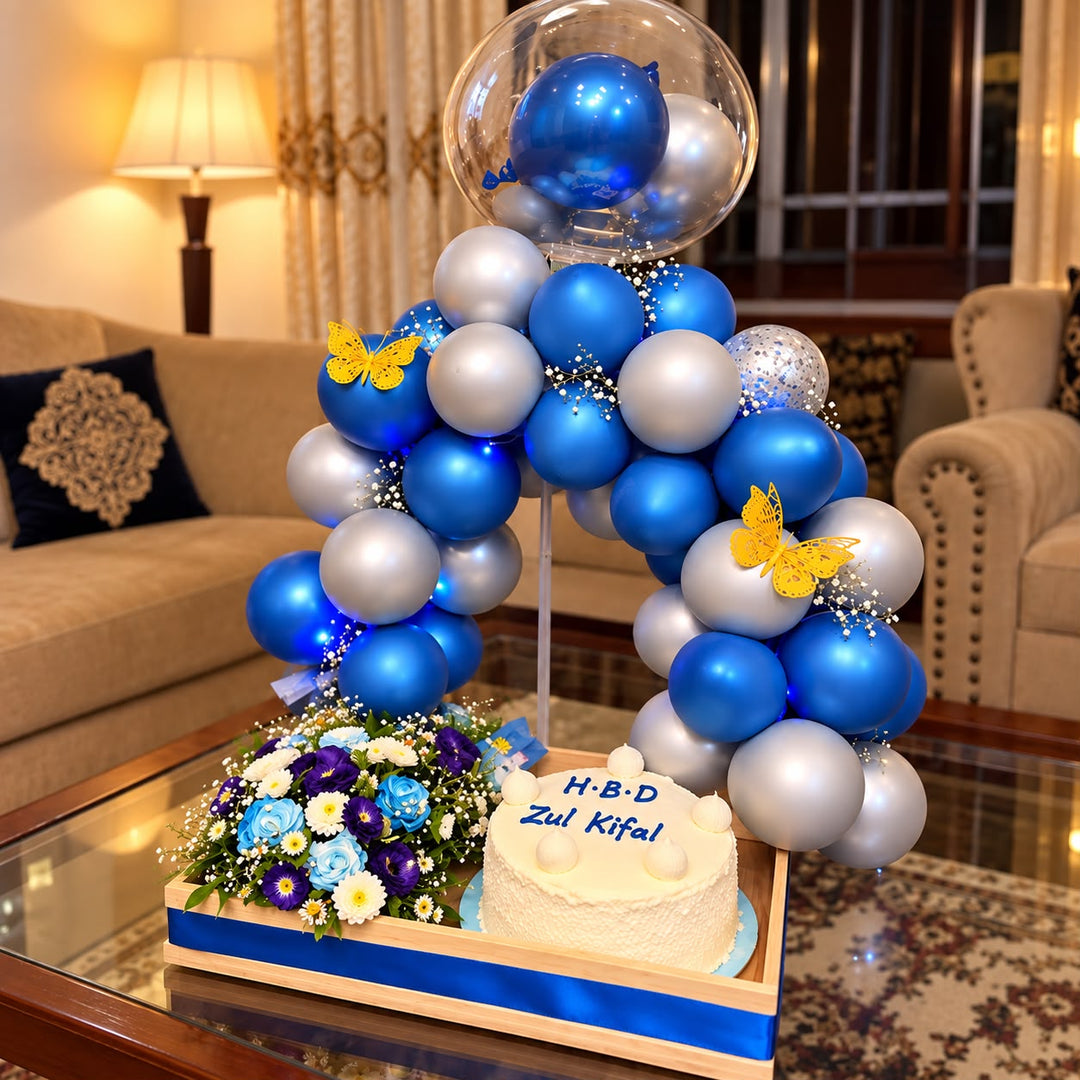 Sapphire Butterfly luxury birthday gift with blue balloon arch, flowers, butterfly decorations and custom cake