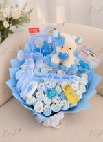 Load image into Gallery viewer, Little Blue Blessing newborn baby boy gift bouquet with baby essentials, plush toy, grooming kit, pacifiers, socks, baby bottle, and premium blue wrapping.
