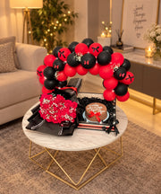 Crimson Noir Gift Set with red flower bouquet, birthday cake, chocolates and red-black balloons